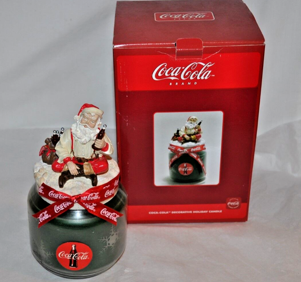  COCA COLA  CHRISTMAS SANTA Holding COKE with bag of Coke Bottles CANDLE  NIB Coca-Cola