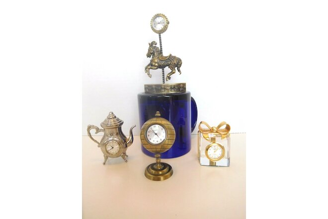 Lot of 4 Miniature TIMEX Quartz Clocks
