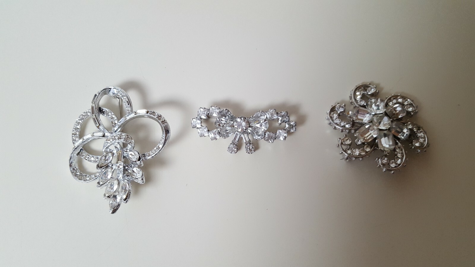 LOT OF 3 DRESSY SILVER COLORED RHINESTONE BROOCHES/PINS Unbranded