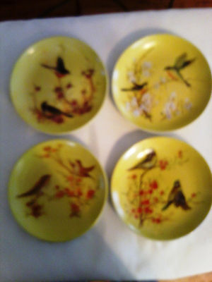 4 Vintage 6" bird plates, yellow background with floral acccents Unknown none