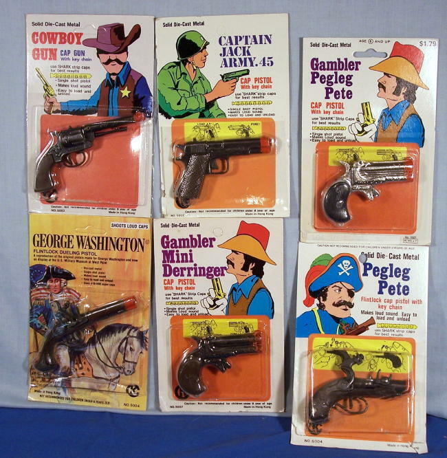 Cap Guns ~ Set of 6 Old Die Cast Cap Gun Key Chain Fobs on Store Display Cards Без бренда