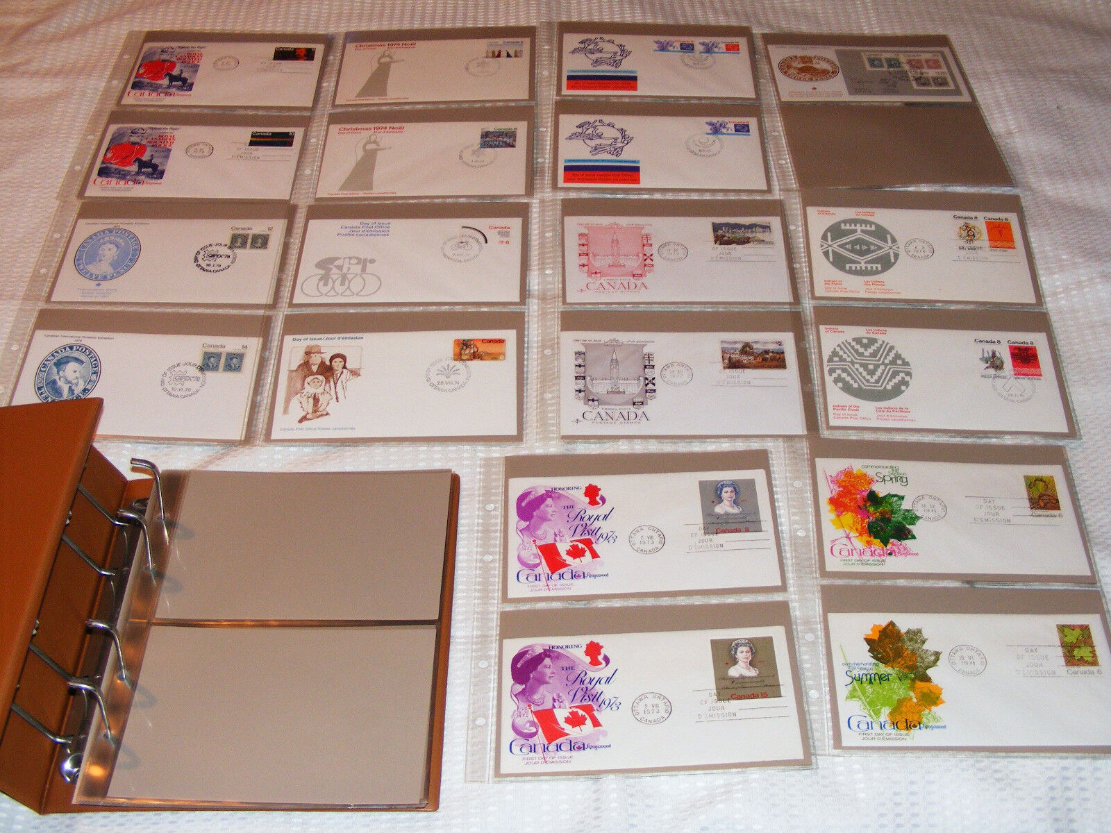 Canada  37  First  Day  Covers  1971 To 1978   In  A  Tan  Coloured   Safe Album Без бренда