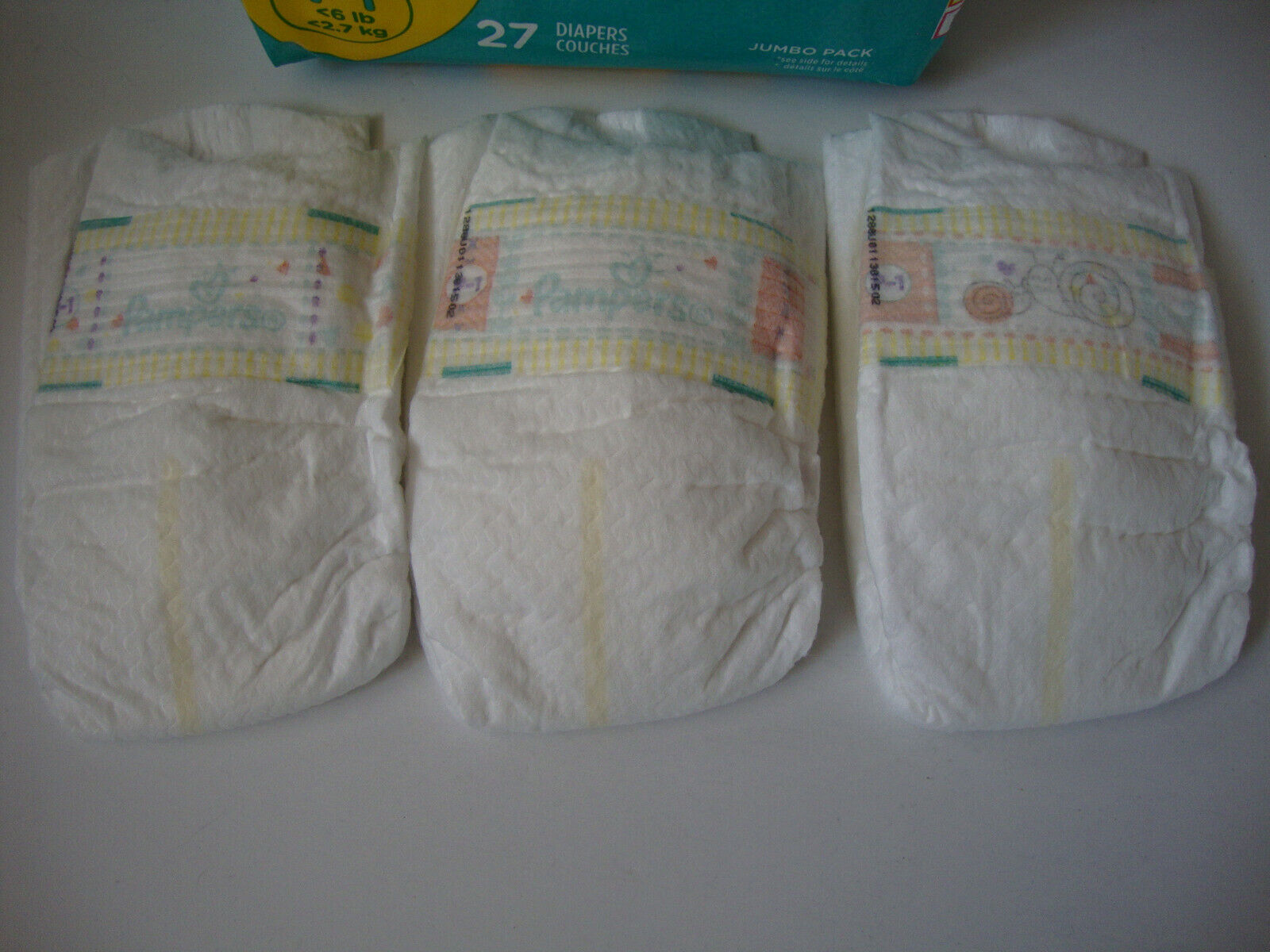 Pampers Swaddlers Preemie 6 pounds lot of 3 individual diapers reborn doll Pampers - фотография #2
