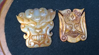 Group of Two Antique Nephrite Jade Tao-Tieh Masks. Без бренда