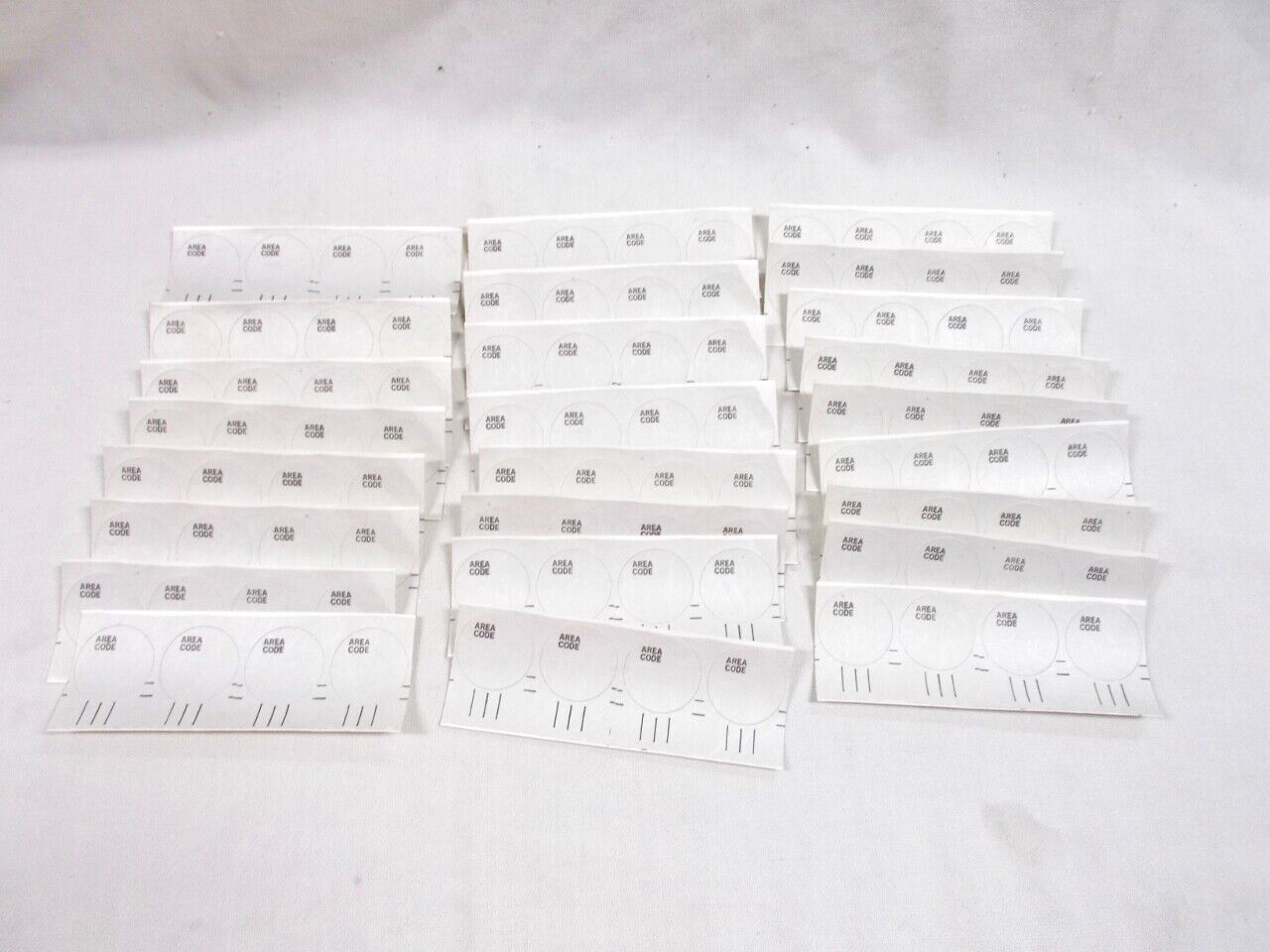 25 Strips of Four (100) Dial Center Stickers  Unknown