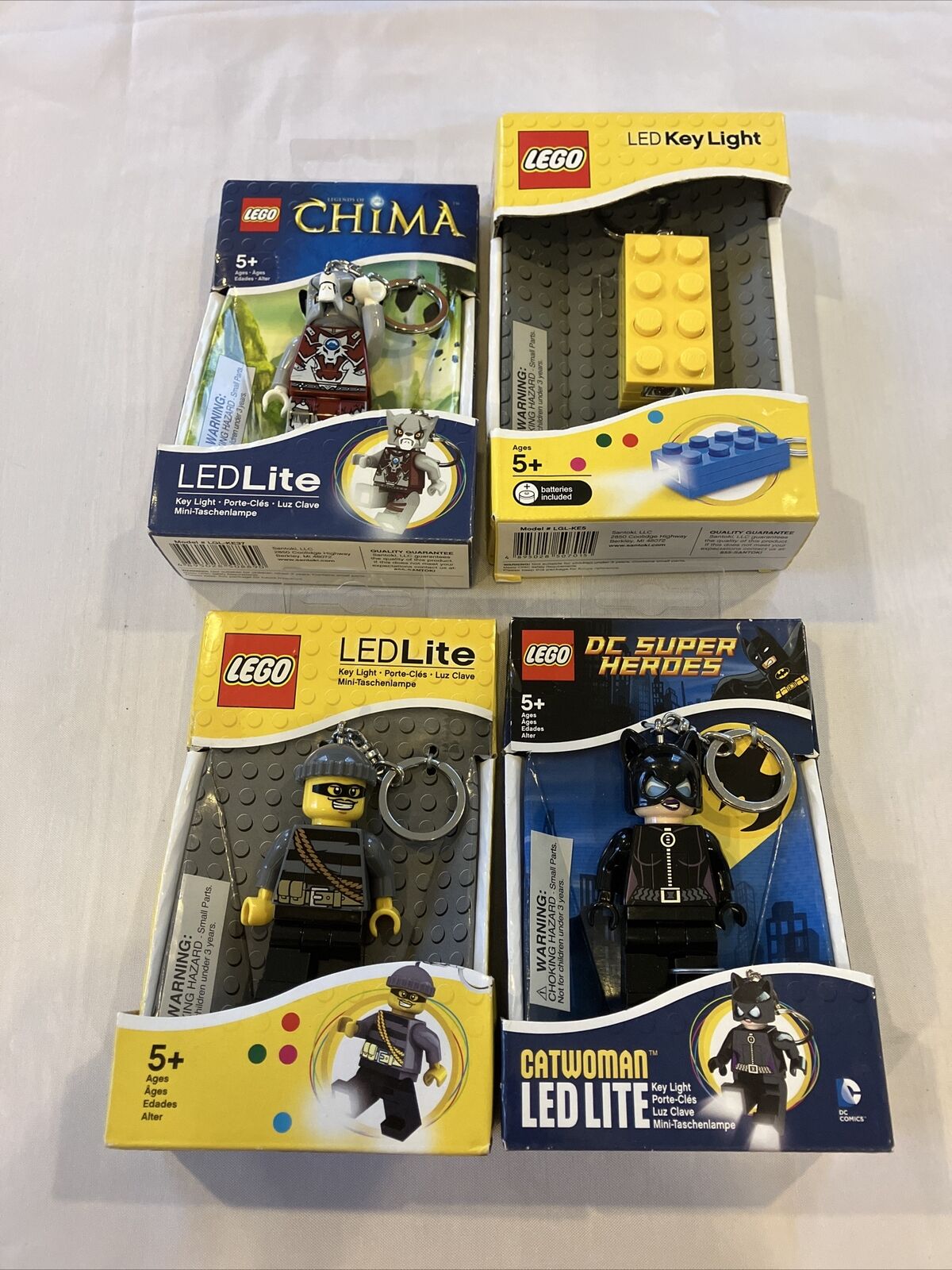 Lot Of 4 Factory Sealed Lego Led Lite Keychains - China Cateoman Brick Robber LEGO