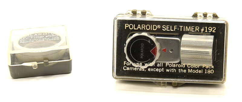 EXCELLENT CASED P0LAROID SELF TIMER #192 PLUS CASED POLAROID UV FILTER #585 Polaroid