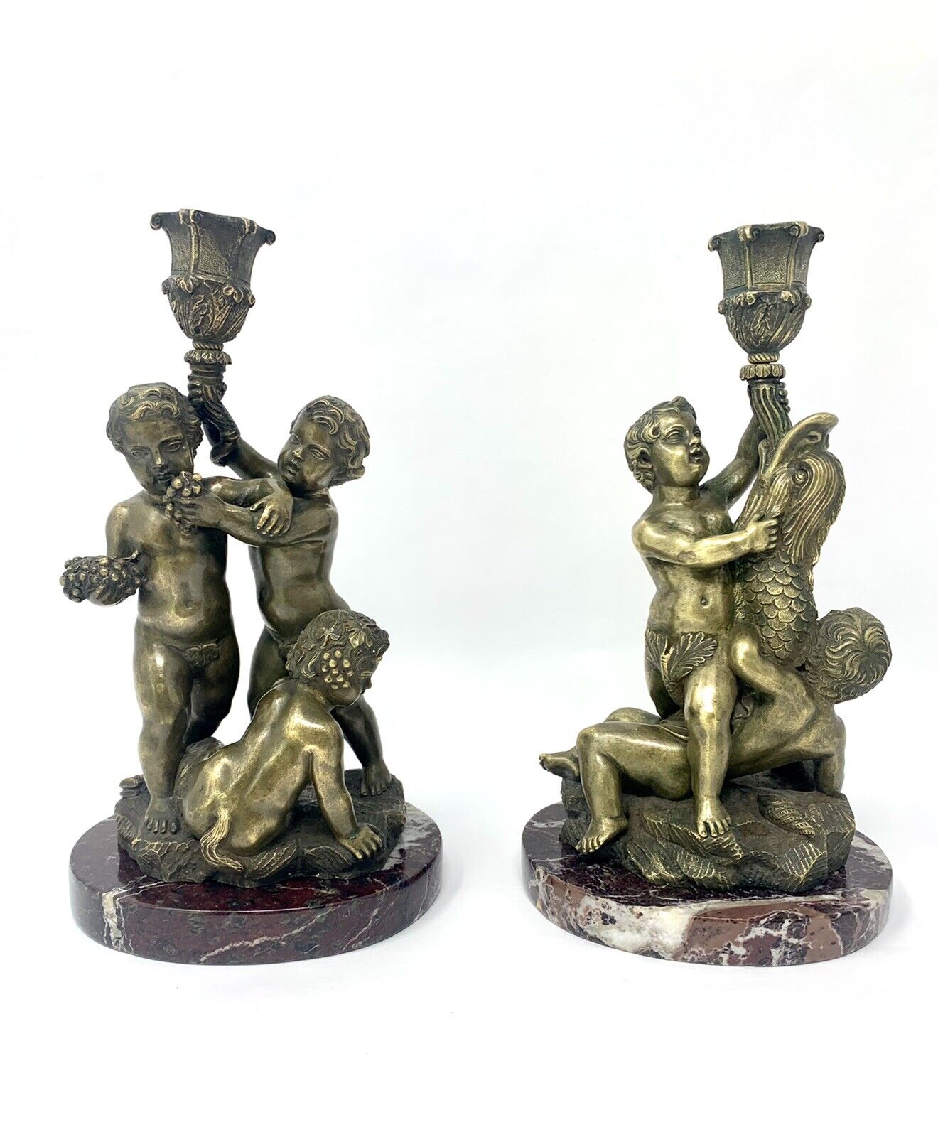 Unusual pair of antique Continental bronze figural candlesticks Без бренда
