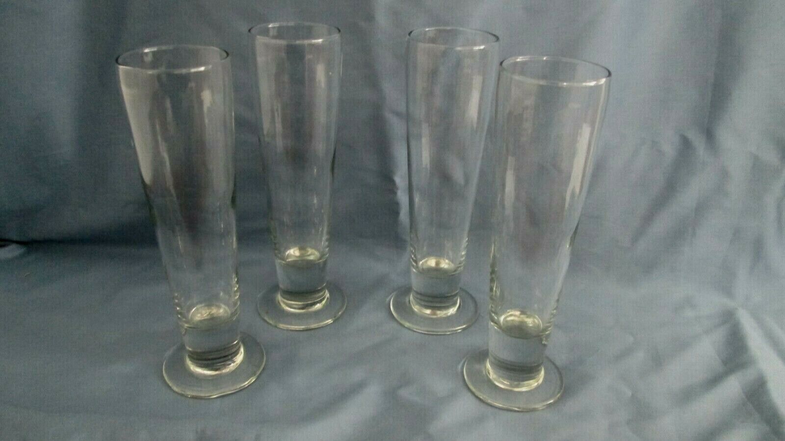 PILSNER set of 4 footed beer glasses.  9 3/8 High  Unknown--Pilsner