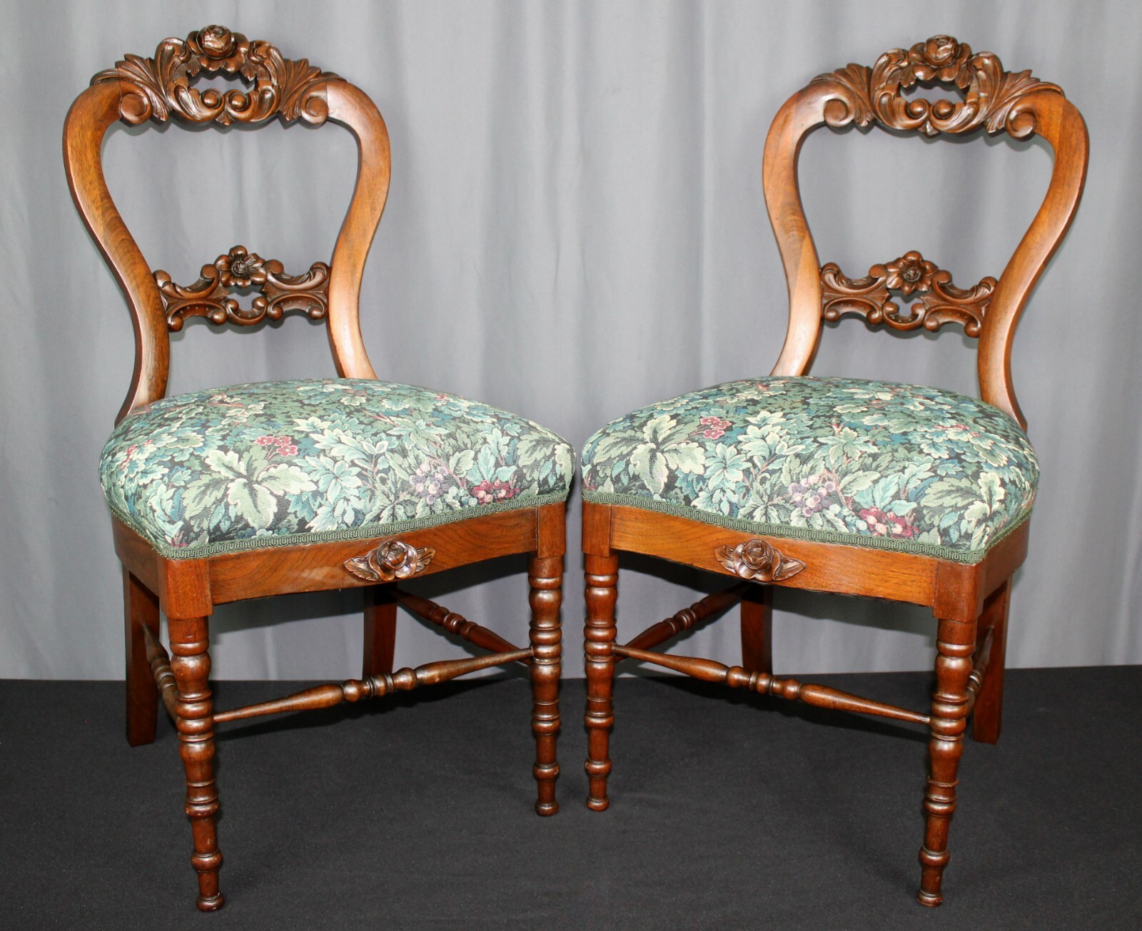 Pair of rose carved balloon side chairs, Late Victorian, Mahogany, turned legs Unbranded