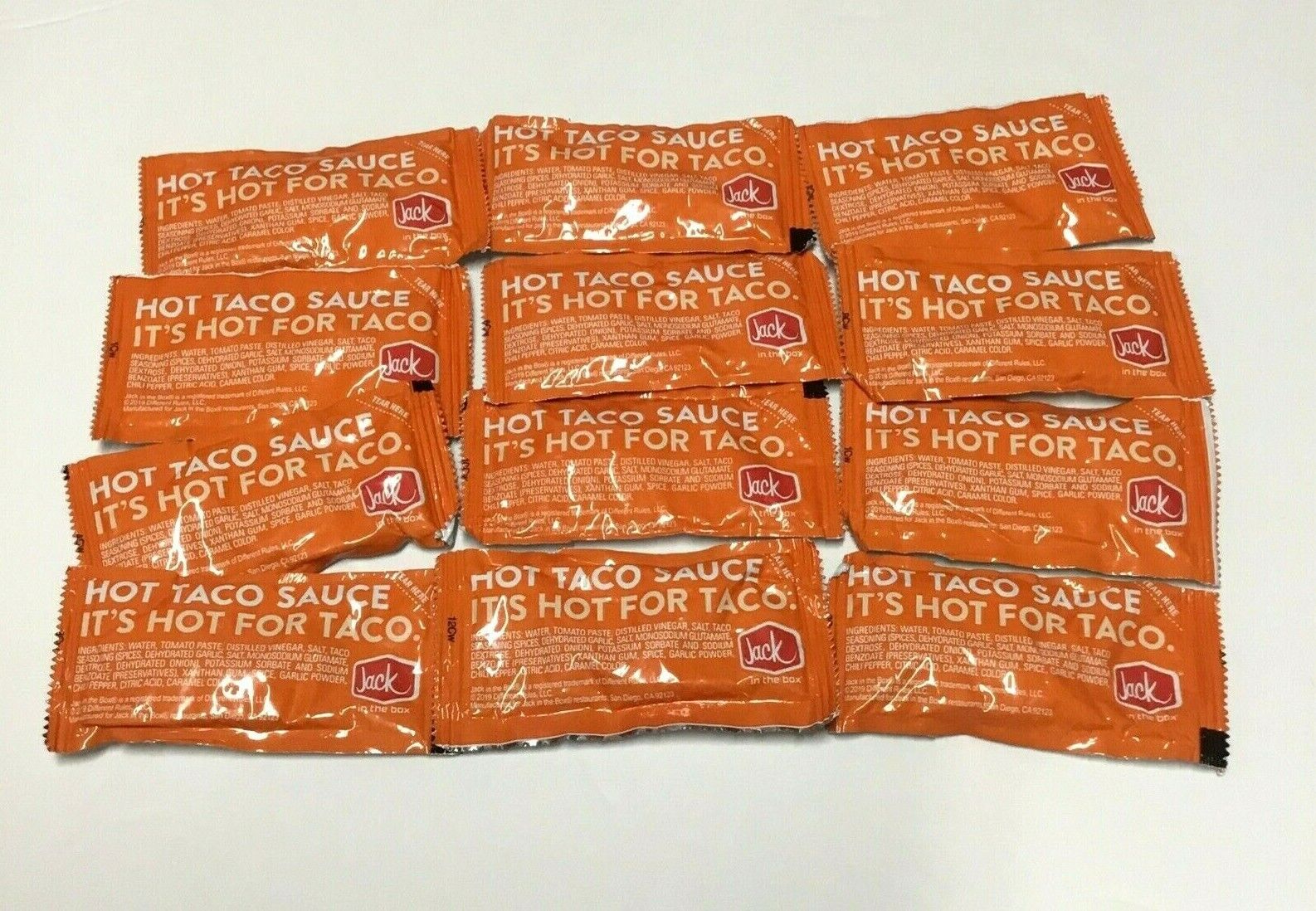 12 Lot Jack In The Box Hot Taco Sauce Packets New Ready To Ship TACO BELL - фотография #2