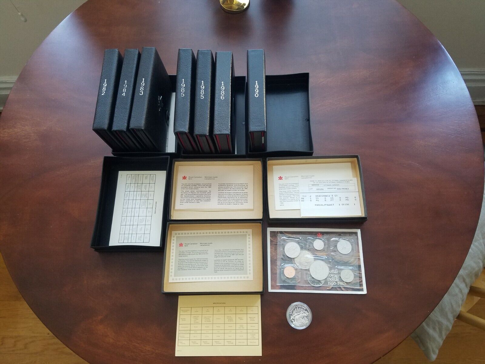 Collection of 56 Canadian Uncirculated coins from 1980-1990 in Original Boxes Без бренда