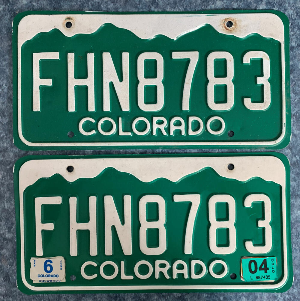 COLORADO LICENSE PLATES Embossed Aluminum, Mountains at Top, Serial FHN8783 USED Без бренда