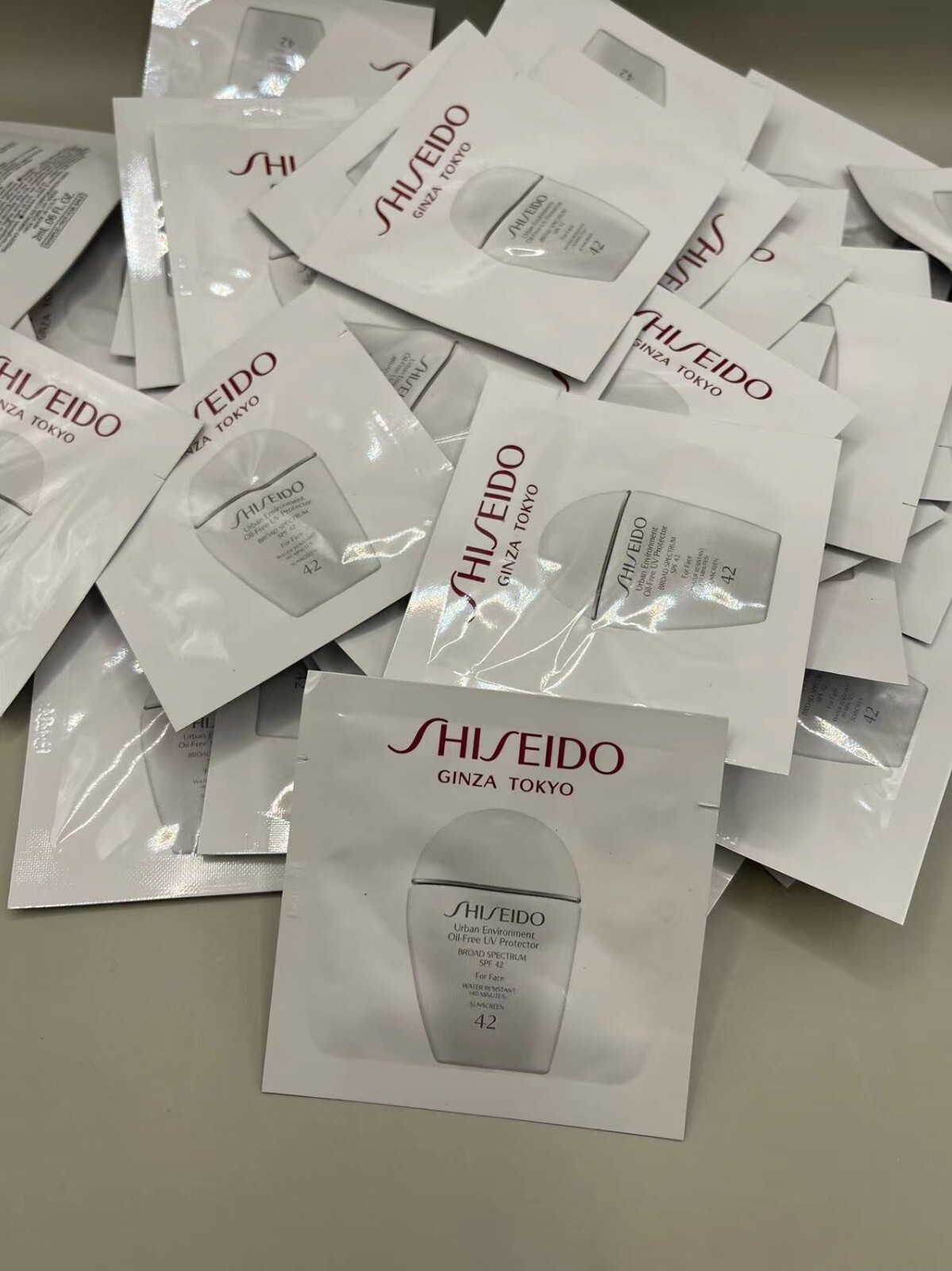 LOT OF 62 SHISEIDO URBAN ENVIRONMENT OIL-FREE UV PROTECTOR SPF 42 FOR FACE 2ML Shiseido