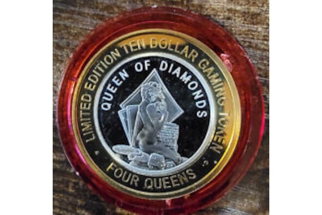 2010 FOUR QUEENS $10 RED Cap .999 Silver Strike Queen of DIAMONDS