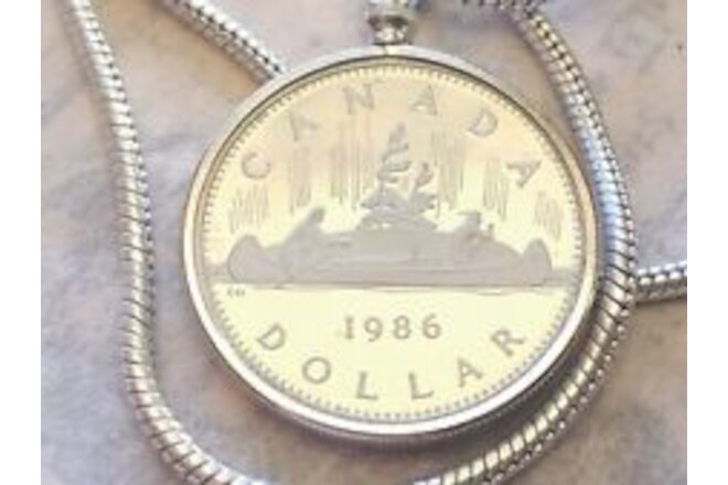 1986 CANADA Voyageur Dollar Coin Pendant on a 24"  18KGF White Gold Filled Chain