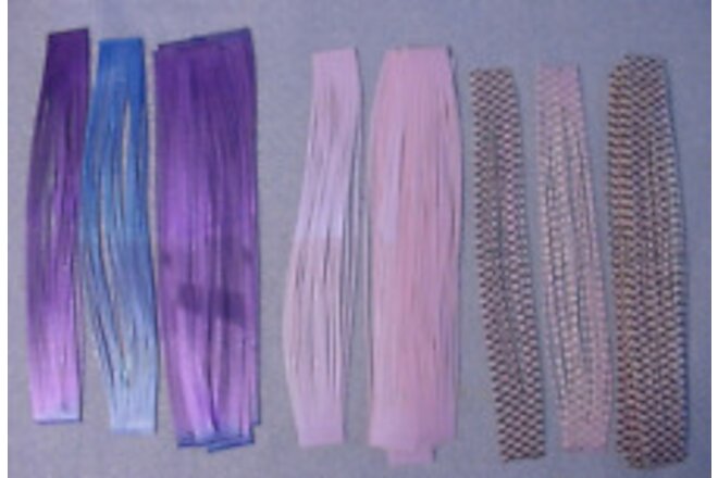 27 ~ Tabs Big Strike Silicone Skirt Material Mix- Purples -See Item Description.
