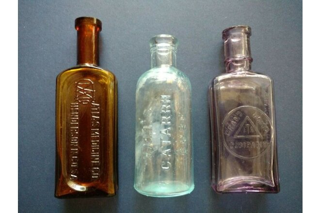 Three Old Patent Medicine Snake Oil Elixir Glass Bottles, Amber, Aqua, Purple