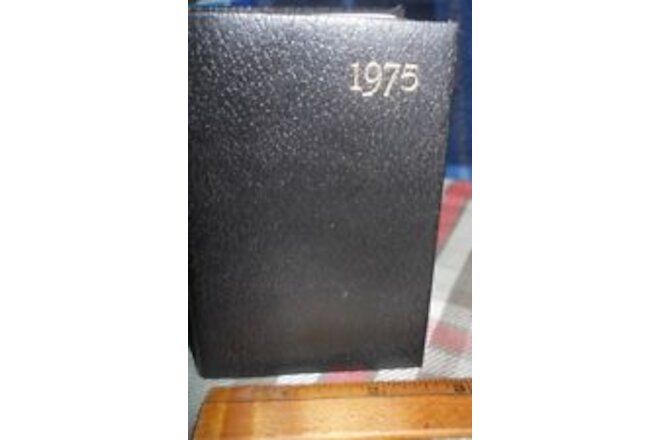 1975 * 1(one) black-pocket diary *2 1/2" x 4 h" in 2024 age 49 calendar/address