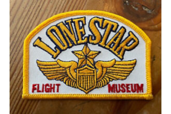 LONE STAR FLIGHT MUSEUM PATCH ~ GOLD/WHITE/RED COLORS ~ 3.5" x 2.5"