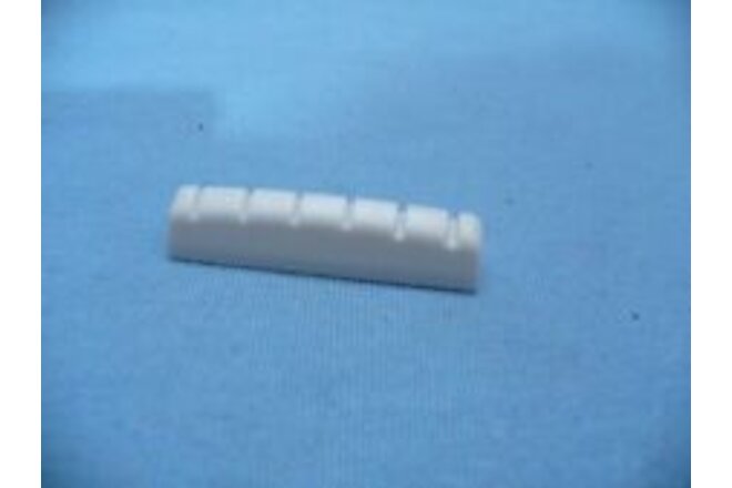 PLASTIC ABS SLOTTED CURVED BOTTOM NUT FOR A SG - LP GUITAR NECK USA SHIPPING !!