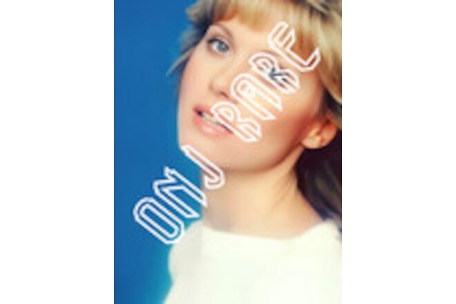 Olivia Newton-John  12 x photos, Don't Stop Believin', and more