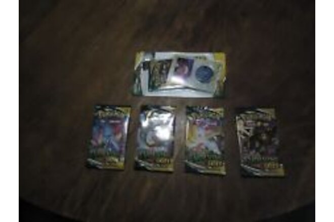 Pokemon Evolving Skies Booster Pack Art Set 5 Booster Packs Eevee card, coin.