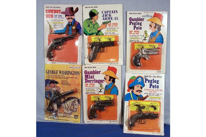 Cap Guns ~ Set of 6 Old Die Cast Cap Gun Key Chain Fobs on Store Display Cards