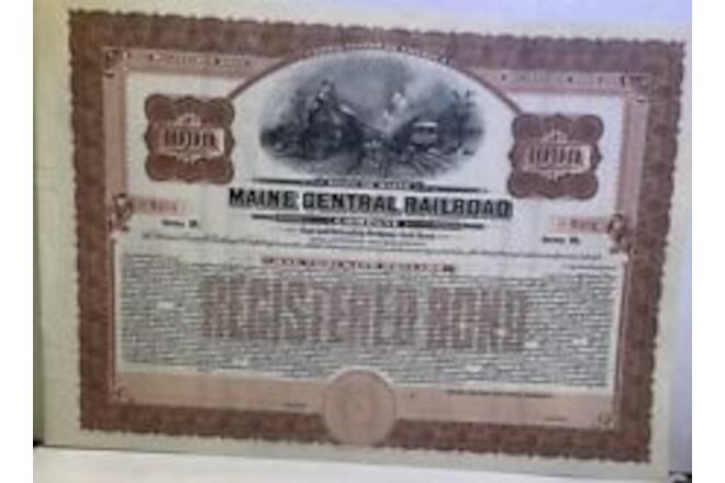 19—Maine Central RR Stock Certificate-BOND $1000. Rust Color. 2 Trains On Tracks
