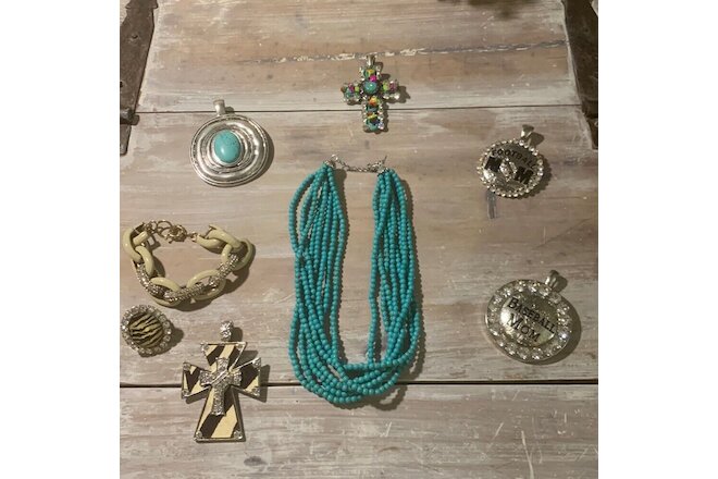 Mixed lot of costume jewelry. 5 Blingy pendants. 1 Necklace 1 Bracelet & 1 Ring