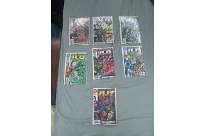 JLA Incarnations #1-7 By DC COMICS. Complete mini-series. NM Condition!