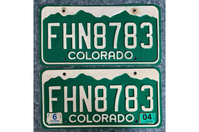 COLORADO LICENSE PLATES Embossed Aluminum, Mountains at Top, Serial FHN8783 USED