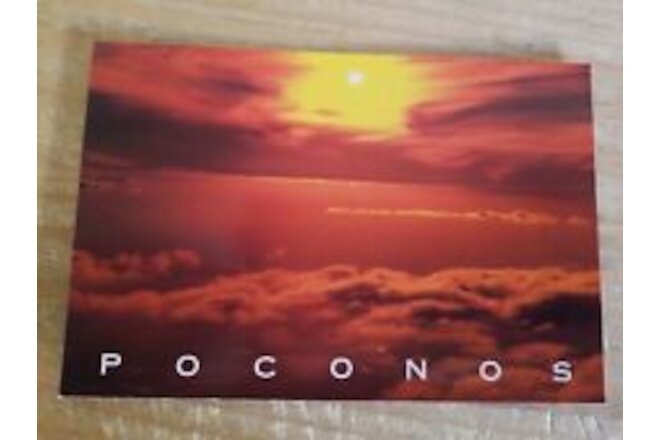 SUNSET OVER POCONO MOUNTAINS POST CARD.UNUSED.